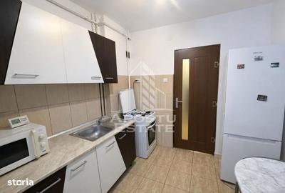 Apartament cu 2 camere semidecomandat, mobilat în Central