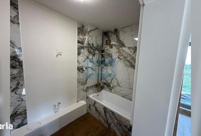 Apartament cu 3 camere semidecomandat în Borhanci