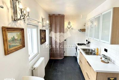 Apartament cu 4 camere decomandat, mobilat în Capitale - 11