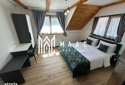 Casă cu 7 camere cu Teren 1000 Mp în Porumbacu de Jos - 8