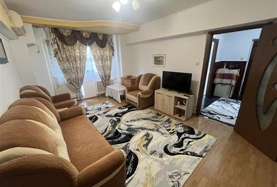 Apartament cu 2 camere semidecomandat, mobilat în Tei