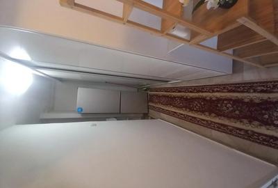 Vand garsoniera in Campulung, cartierul Grui, decomandata, confort 1 - 2