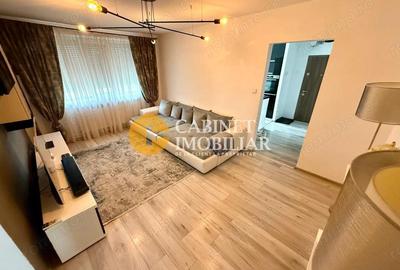 Apartament cu 3 camere semidecomandat, mobilat în Central