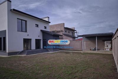 Casa 4 camere, 3 bai, teren 500 mp, Frumusani