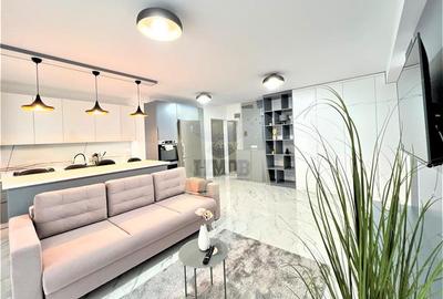 Apartament cu 3 camere semidecomandat, mobilat în Central
