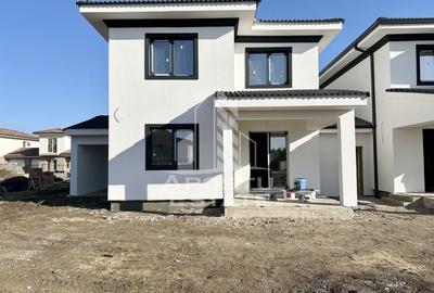 Jumatate de duplex cu 5 camere despartit prin garaj, 131 mp utili