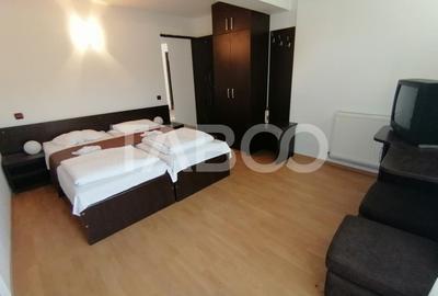 Pensiune 13 camere 16 bai sauna piscina si teren 1565 mp Cisnadioara - 10