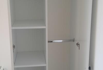 Garsonieră decomandată în Titan