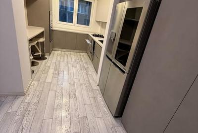 Apartament cu 3 camere semidecomandat, mobilat în P-ța Dorobanți - 14