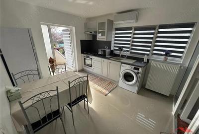 Garsoniera 45 mp (FACTURI INCLUSE), curte+ foisor, parcare - 1