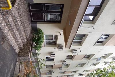 Garsonieră decomandată în Central - 7