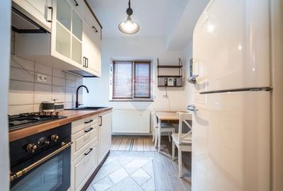 Apartament cu 2 camere semidecomandat, mobilat în Tractorul - 10