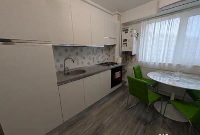 Apartament cu 2 camere semidecomandat, mobilat în Central