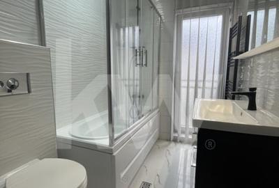 2 dormitoare, living generos si bucatarie inchisa - apartament de inchiriat 2 dormitoare, living generos si bucatarie inchisa - apartament de inchiriat - 9