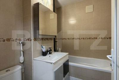 Apartament cu 3 camere semidecomandat în Calea București