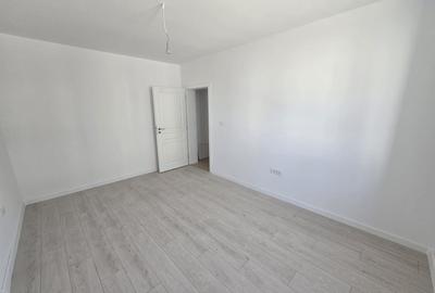 Model spatios - 55 mp. Decomandat. Bucatarie inchisa. - 9