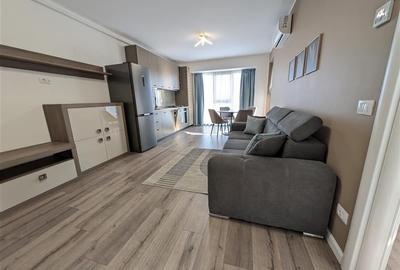 Bloc nou - langa Universitatea Bacovia  si Primarie - 2 camere - mobilat si util - 2