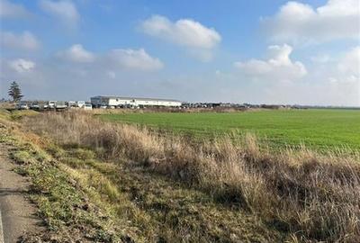 RECO Teren extravilan 11509 mp cu front la E60 -Sacadat - 2