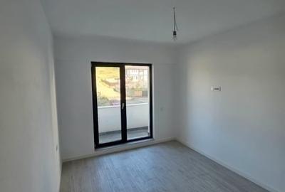 Apartament cu 2 camere decomandat în Bucium - 2