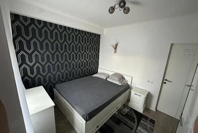 Apartament cu 2 camere semidecomandat, mobilat în Moșnița Nouă
