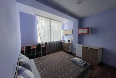 Apartament cu 2 camere decomandat în Tractorul