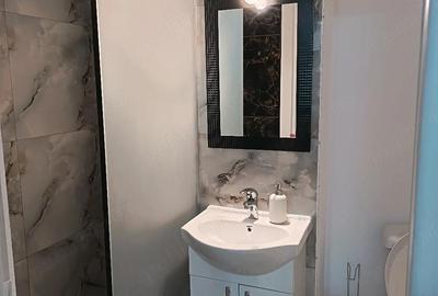 Apartament cu 2 camere nedecomandat în Buduș - 1