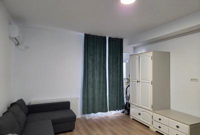 Garsoniera utilata,mobilata ,totul nou ,prima inchiriere ,str Oituz nr 71 - 9