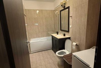 Apartament cu 2 camere semidecomandat, mobilat în Central