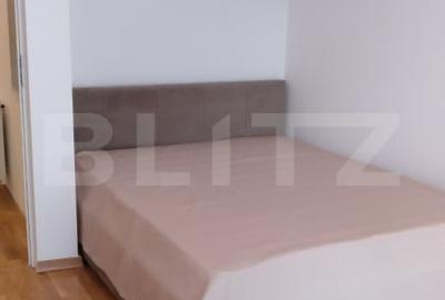 Apartament cu 2 camere semidecomandat, mobilat în Central