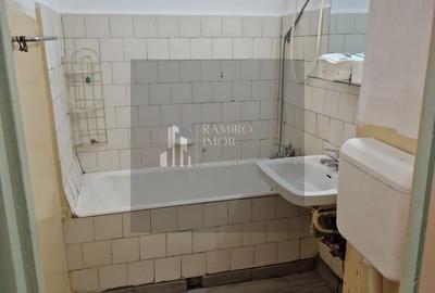 Garsonieră decomandată în Titan