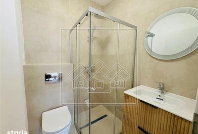 Apartament cu 3 camere decomandat în Cristian - 11