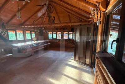 Cabana din lemn rotund, 2 camere, 140 mp, teren 2800 mp, Pal - 17