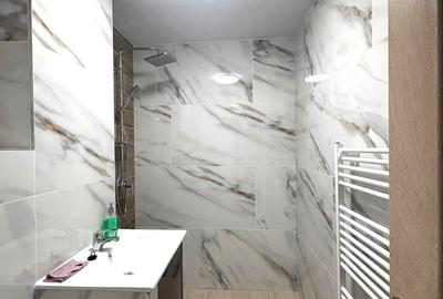 Garsonieră decomandată în Central - 7