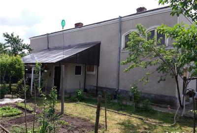 Casă cu 6 camere cu Teren 1000 Mp în Putineiu - 10