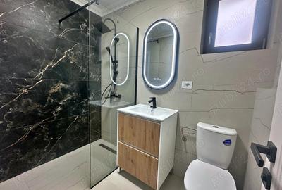 Casă cu 5 camere cu Teren 500 Mp în Căpățânești - 4