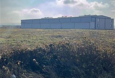 RECO Teren extravilan 11509 mp cu front la E60 -Sacadat - 4