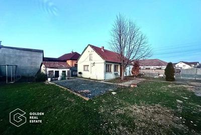 Teren 530 mp cu utilitati, constructie 3 camere cu centrala proprie,zona Poltura