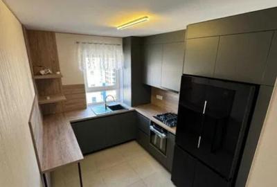 Apartament cu 3 camere decomandat în Tractorul - 1