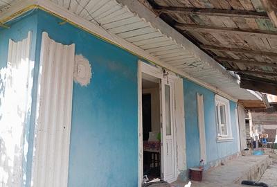 Casă cu Teren 215 Mp în Central