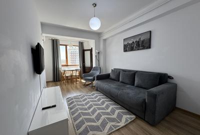 Apartament cu 2 camere semidecomandat, mobilat în Central