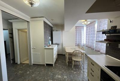 Apartament cu 7 camere decomandat în