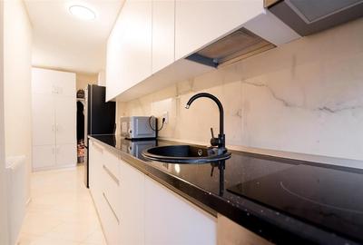 RECO Garsoniera de Lux Rogerius Etaj-ul 1 - 4