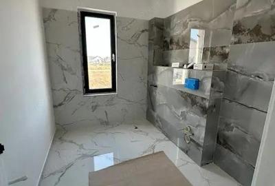 Casă cu Teren 200 Mp în Central