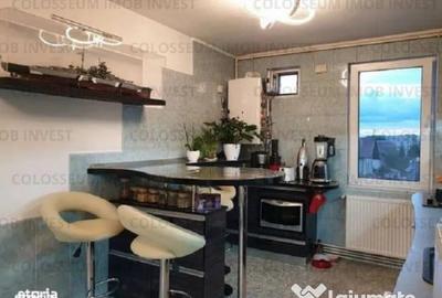 Apartament cu 4 camere decomandat în Tractorul - 8