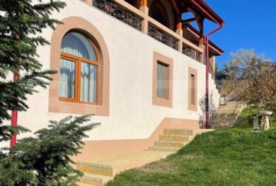 Casă cu 7 camere cu Teren 1000 Mp în Bucium