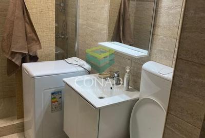 Apartament cu 3 camere semidecomandat, mobilat în Calea București - 11
