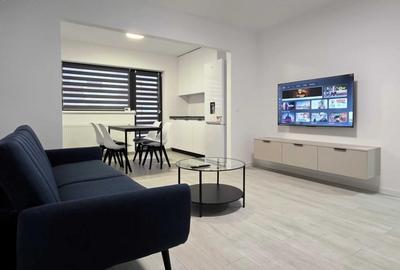 Apartament cu 2 camere semidecomandat, mobilat în Costin Georgian