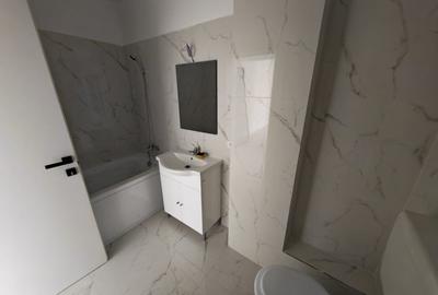 Apartament cu 2 camere decomandat în Popești-Leordeni - 9