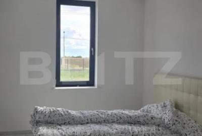 Casă cu 4 camere cu Teren 750 Mp în Păulești - 1