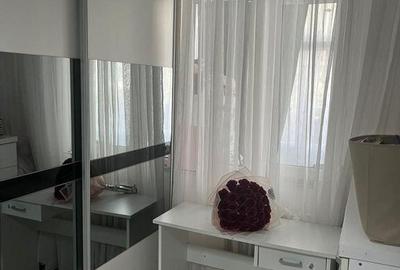 Apartament cu 2 camere semidecomandat, mobilat în Km 4